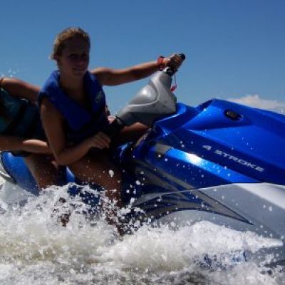 a man riding a jet ski in the water