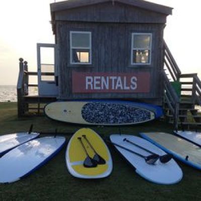 a boat sitting next to a body of water